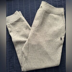 Fashionable grey men’s sweatpants. Polo brand.